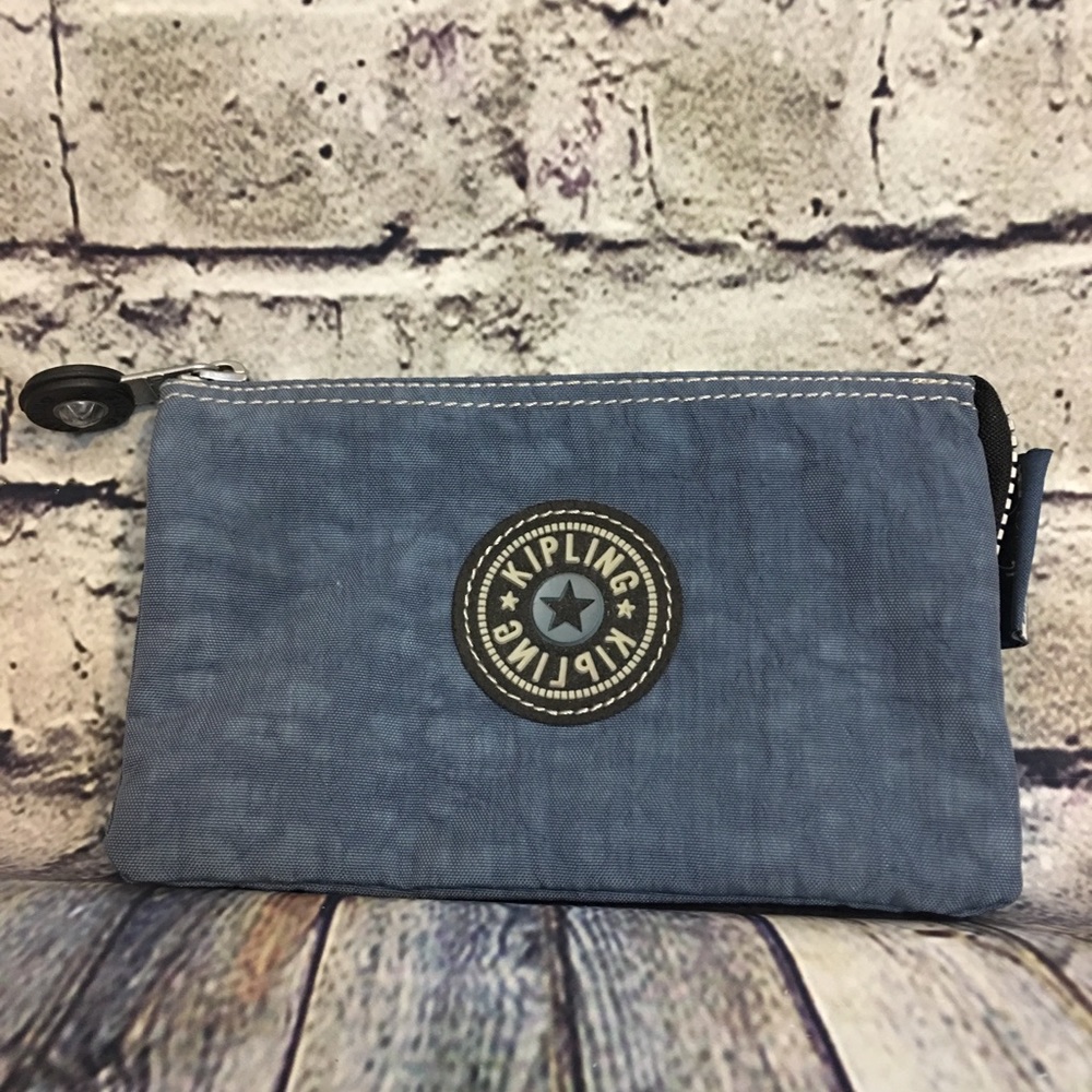 Kipling blue private transporter wallet/handbag